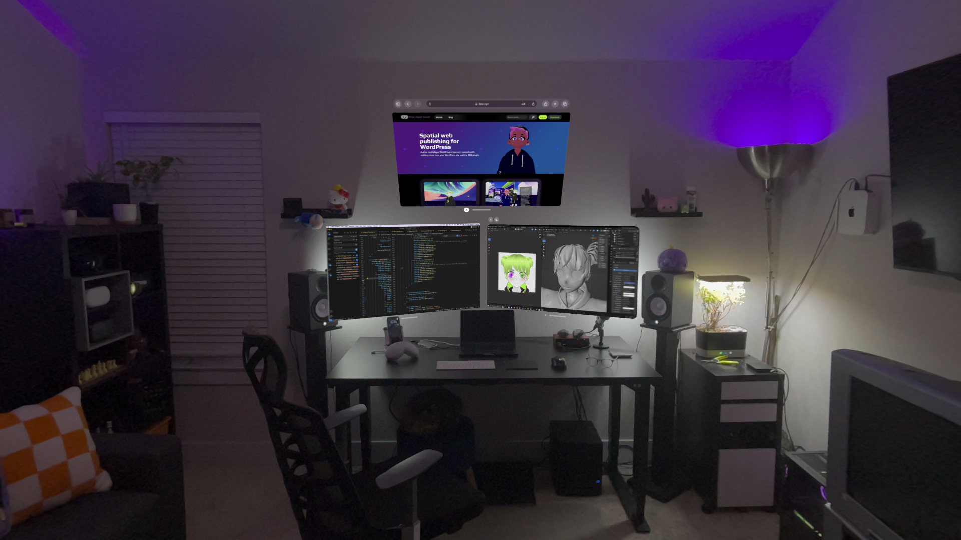 A view of my work space in a darker room. My desk has three virtual screens on the left right and above. On the left there is a macbook screen, on the right is the windows screen. There is a wall mounted m1 mac mini that is also able to connect with the display array. in the screen above the two virtual displays is a safari window with my website hompage open.